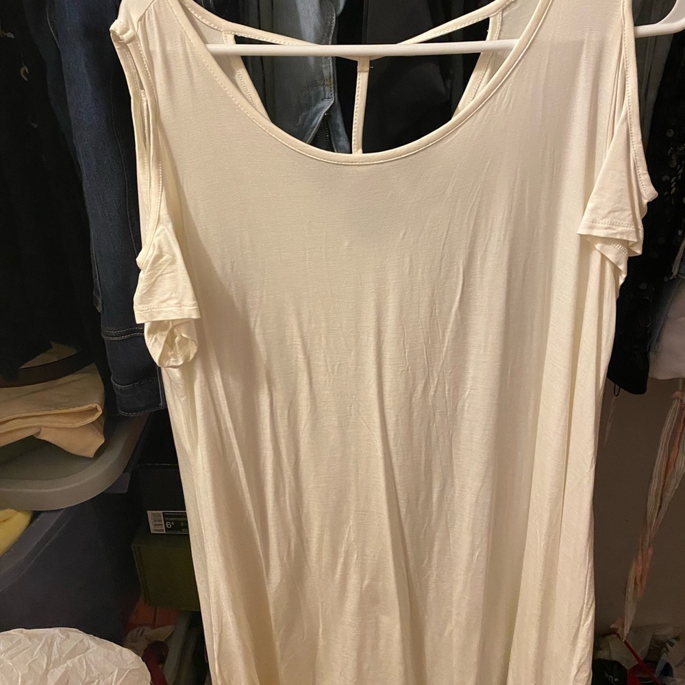 Very cute shoulder out shirt